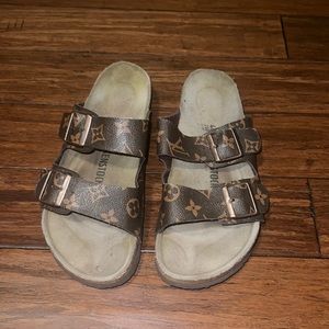 Size 40 Birkenstock/Louis Vuitton sandals.